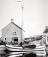 Makkum, Grote Zijlroede, omstreeks 1960. De Anna Maria als jacht van de fam. Bolier uit Den Helder ligt hier aan de Turfkade, vlakbij de plateelfabriek van de fa. Tichelaar.